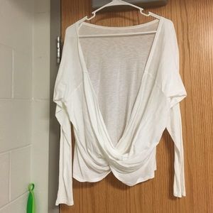 Open back Fabletics workout top.